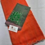 Orange / forest-green blouse